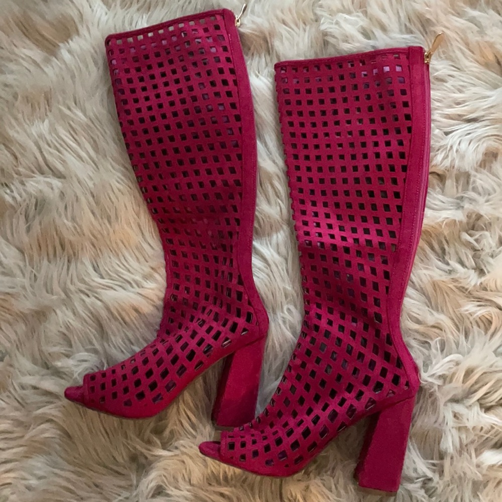 Tall deep beautiful pink suede boots with toe out
